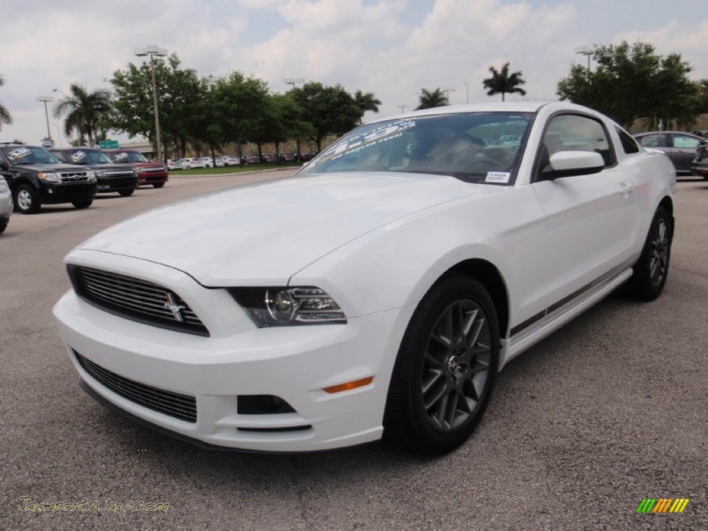 2014 Mustang V6 Premium Coupe - Oxford White / Medium Stone photo #13
