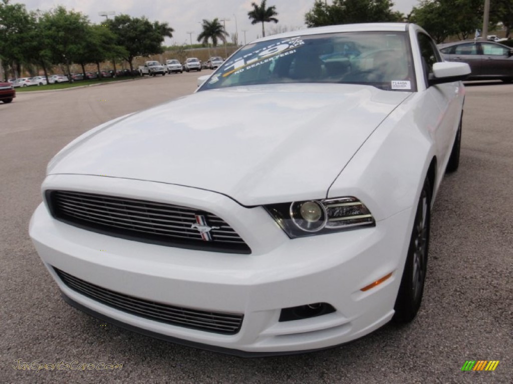 2014 Mustang V6 Premium Coupe - Oxford White / Medium Stone photo #14