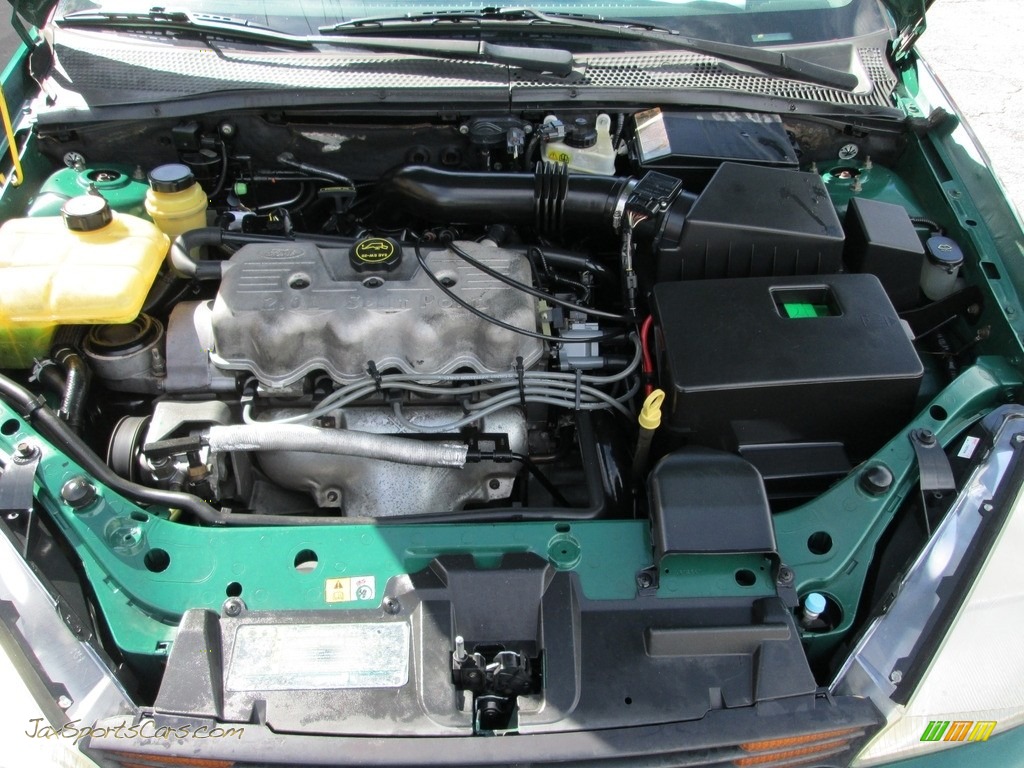 2002 Focus SE Sedan - Grabber Green Metallic / Medium Graphite photo #22