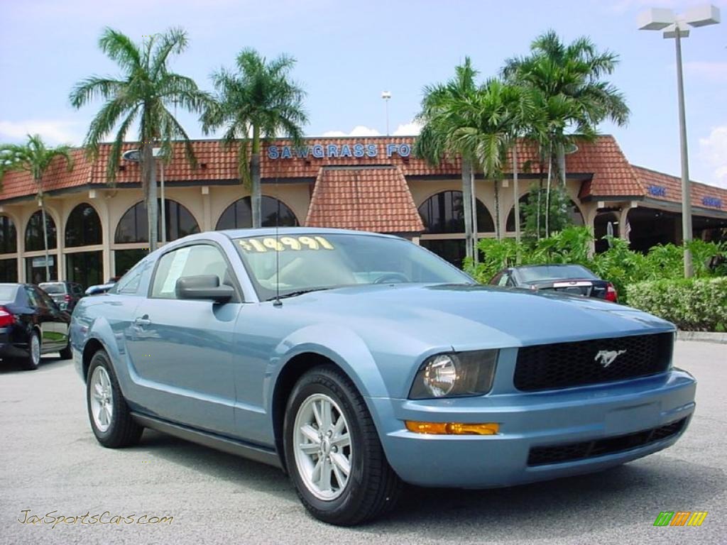 Windveil Blue Metallic / Medium Parchment Ford Mustang V6 Deluxe Coupe