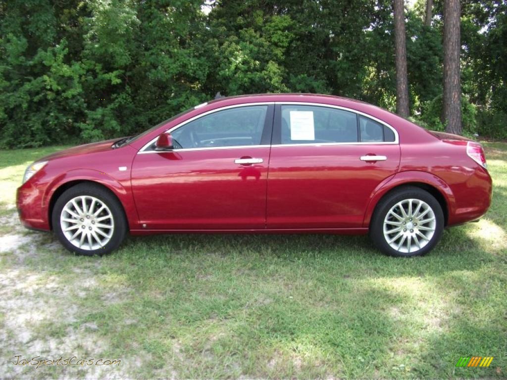 Red Jewel Tintcoat / Black Saturn Aura XR V6