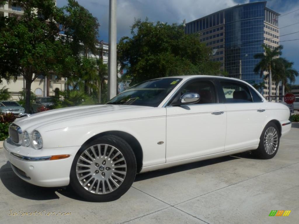 White Onyx / Charcoal/Red Jaguar XJ Vanden Plas White Onyx / Charcoal/Red Jaguar XJ Vanden Plas