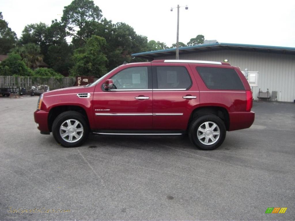 Infrared / Ebony Cadillac Escalade AWD