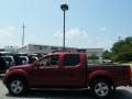 Nissan Frontier LE Crew Cab Red Brawn photo #2 Nissan Frontier LE Crew Cab Red Brawn photo #2