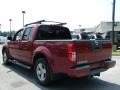 Nissan Frontier LE Crew Cab Red Brawn photo #3 Nissan Frontier LE Crew Cab Red Brawn photo #3