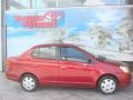 Toyota ECHO Sedan Impulse Red Pearl photo #1